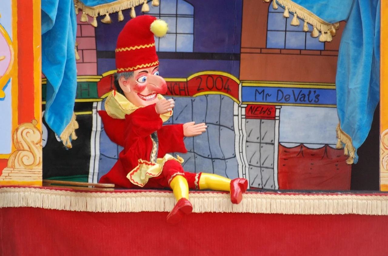 What role did puppetry play in educating children in rural Asia?