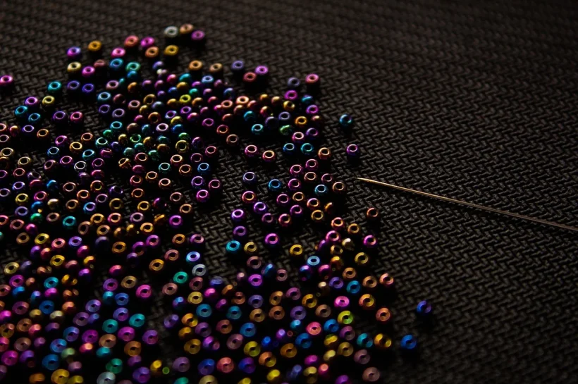 What stories were embedded in African beadwork used for rituals?