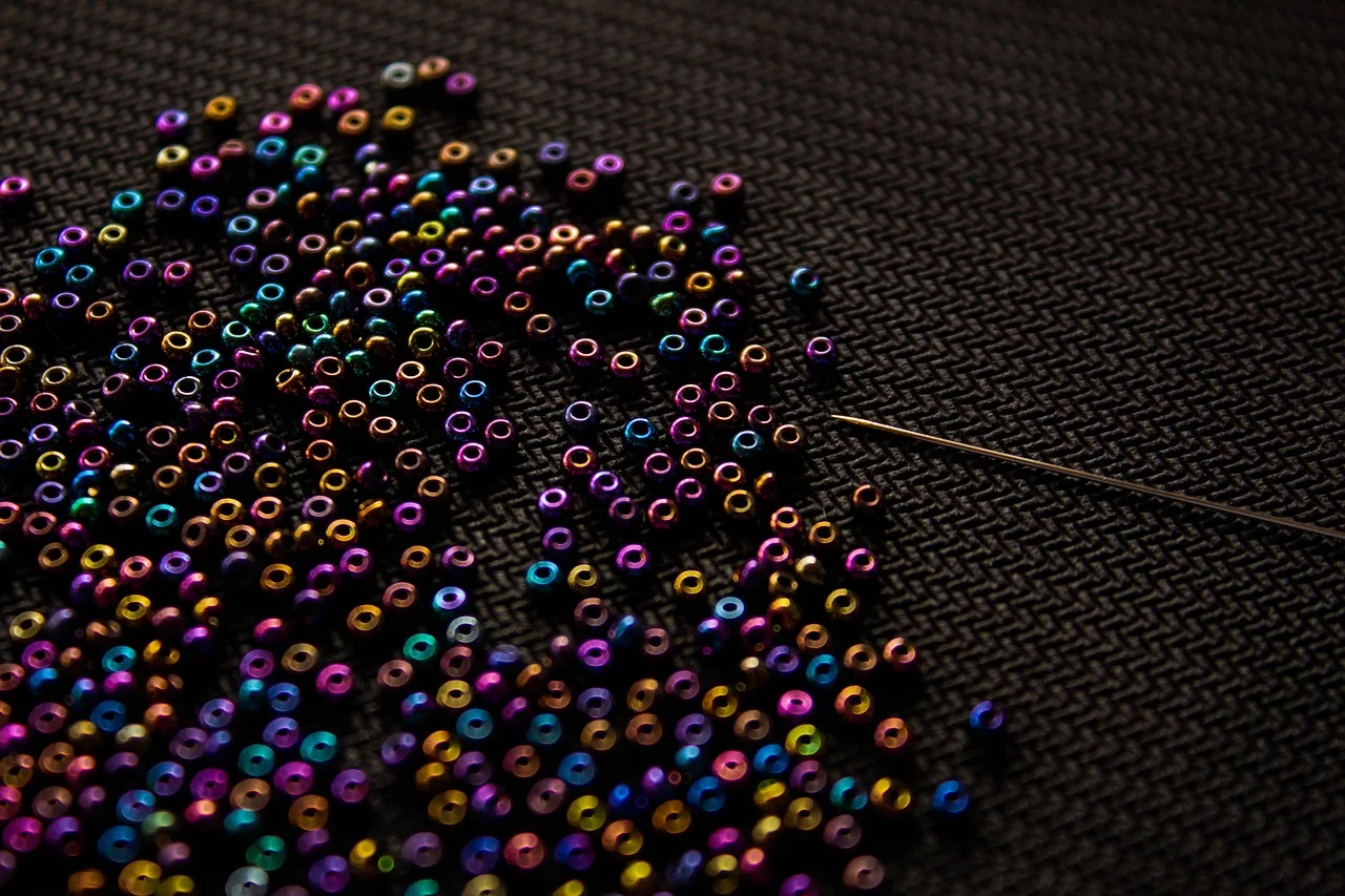 What stories were embedded in African beadwork used for rituals?